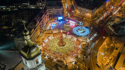 Fototapeta na wymiar Beatiful view of Christmas on Sophia Square in Kyiv, Ukraine. Main Kyiv's New Year tree and Saint Sophia Cathedral on the background view