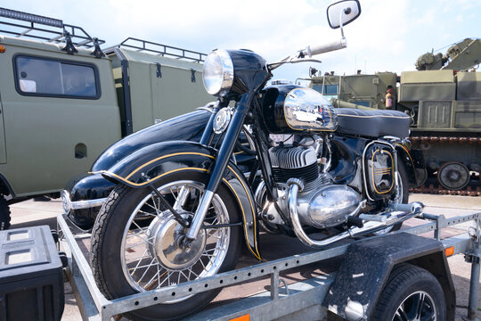 An old motorcycle Jawa on a trailer