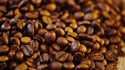 close up of fresh and roasted coffee beans.