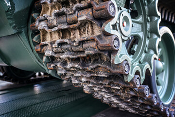 Steel army tank caterpillar tread tracks, closeup detail