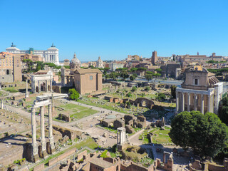 Fototapeta na wymiar View of Foro Romano and it's many structures from viewpoint at Palatine Hill - Rome, Italy
