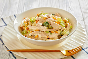 salad of chicken breast, corn, ananas, cucumber