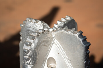 A polycrystalline carbide drill bit, using for drill a subsurface rock structure in oil drilling...