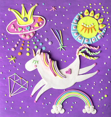 Fototapeta na wymiar Cute flying unicorn pony horse in space. Handmade clay illustration decorated with rainbow, diamond, spaceship. Nursery baby art craft.