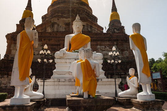 Statue of Buddha and his disciples at Ayutthaya, the 13 century historic Capital city of Kingdom of Siam, Ayutthaya, Phra Nakhon Si Ayutthaya Province, Thailand. 