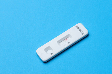 Negative antigen rapid test on blue background
