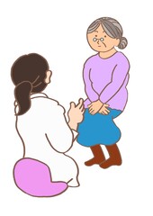 認知症　もの忘れ外来で診察を受ける高齢女性