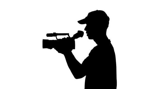 Silhouette of a man in a video camera