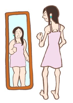 摂食障害　自己イメージの歪みで痩せなくてはと焦る若い女性