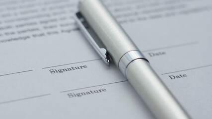 Document and pen on the table.  