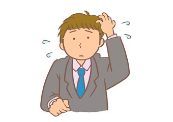 大人の発達障害　困り顔の若いサラリーマン男性