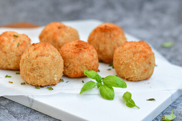 Italian arancini. Home made  tradiotonal rice balls with mozzarella cheese,parsley ,lemon and parmesan cheese.
