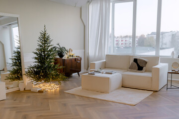 Minimalistic interior in the apartment Large windows White sofa and Christmas tree