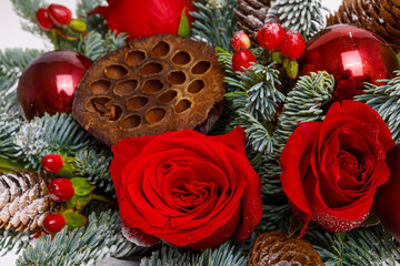 Beautiful winter Christmas floral composition of fresh Nobilis in hat box. Cotton, spruce, sparkling ornaments. Holiday concept. Happy New Year decorations.