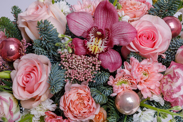 Gift box with beautiful flowers on white background