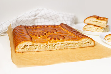 Yeast pie with filling - stewed cabbage with egg. rustic style. Russian cuisine. Homemade cakes.
