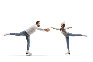 Casual young man and woman practicing ice skating