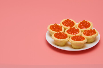 Fototapeta na wymiar Tartlets with red caviar