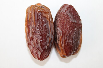 Dry dates isolated on white background. Healthy dates palm fruits. Arabic date palm fruit