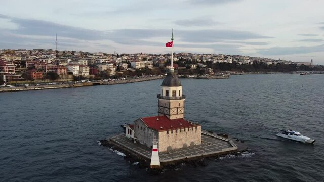 Drone panoramic shot of Maiden's tower, also known as Leander's tower, located in Bosphorus strait separating the continents of Europe and Asia, city of Istanbul, Turkey.