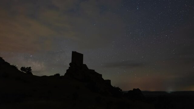 Milky way Timelapse over Zafra castle in Guadalajara, Spain