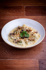 Raviol pasta with mashroom champignon sauce
