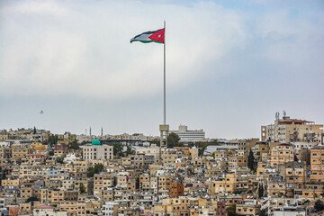 View of Amman City, with big Jordan flag