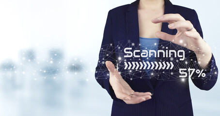 Futuristic and technological scanning. Two hand holding virtual holographic scanner icon with light...