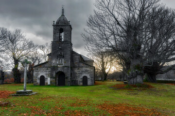 Beautiful Hermitage among ancient chestnut trees. Sanctuary of La Alcobilla located on an old Celtic temple. Zamora, Spain