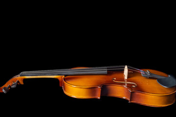 Fototapeta na wymiar Violin isolated on black background with place for text.