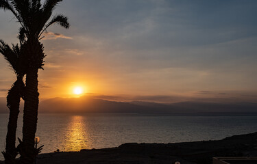 Sunrise above the Dead Sea and ancient Moab Mountain range in the east as seen from Ein Gedi  Youth...