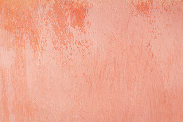 Light pink wall background with scratches and shabby paint