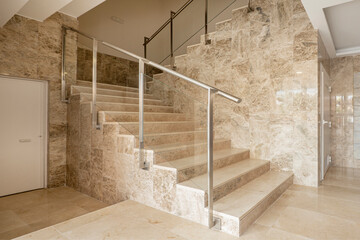 Marble stairs in the lobby of a residential apartment building