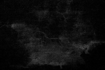 Abandoned black cement plaster wall with crack lines and grunge texture for background