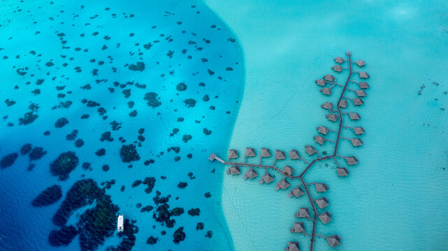 Luxury resorts in the crystal clear polynesian waters