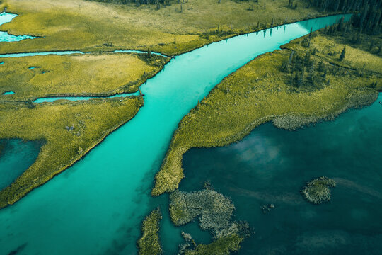 Aerial view of the river in the valley of the Multin lakes in Katun Nature Reserve, Multa, Altai Republic, Russia.