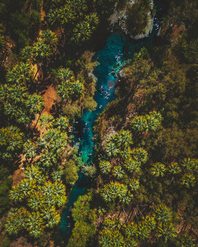 Aerial view of a turquoise natural hot swimming pool in Australia, in the outback.