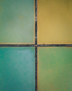 Aerial view of an abstract blue and turquoise clay lake in France near Nancy, topdown.