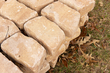 Yellow Rectangular Bricks for Building Sitting Outside in the Fall