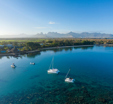 Aerial view of sailing boats at Baie aux Tortues, a small bay along the coast, Mauritius.