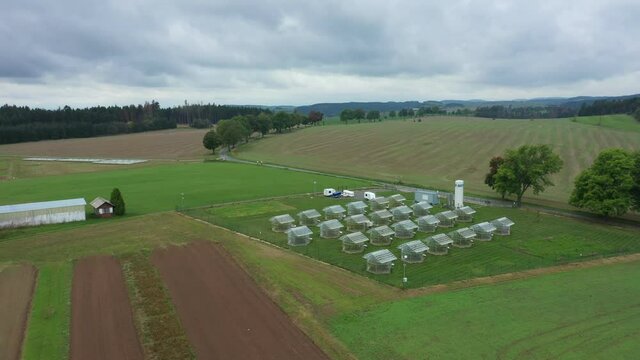 Science greenhouse research open top chambers climate change, corn maize Zea mays ear, scientific on genetics and genes, modern greenhouses observation, scientist harvests, technology technical