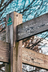 Signs in the park on the autumn evening.
