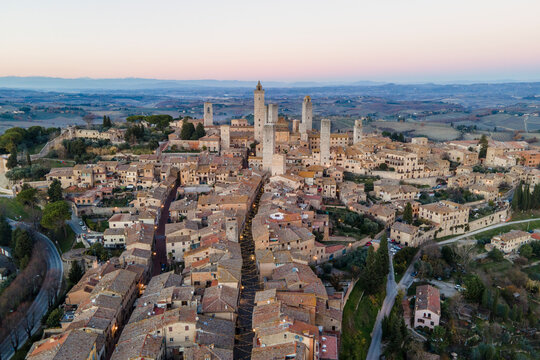 Aerial view of San Gimignano, a small old town with medieval tower at sunset, Siena, Tuscany, Italy.