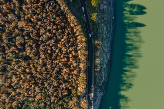 Aerial view of a road driving along the lake Corbara, Baschi, Umbria, Italy.