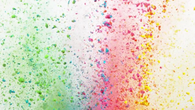 Super slow motion of colored powder explosion isolated on white background. Speed ramp effect. Filmed on high speed cinema camera, 1000fps.