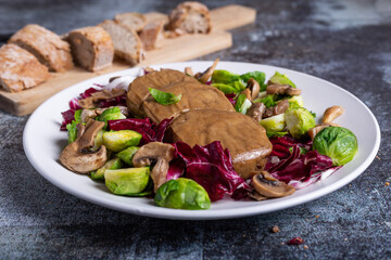 Seitan with vegetables. Ideal for a vegan diet. Plant based dish.