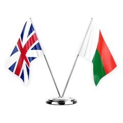 Two table flags isolated on white background 3d illustration, great britain and madagascar