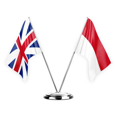 Two table flags isolated on white background 3d illustration, great britain and monaco