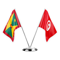 Two table flags isolated on white background 3d illustration, grenada and tunisia