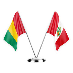 Two table flags isolated on white background 3d illustration, guinea and peru